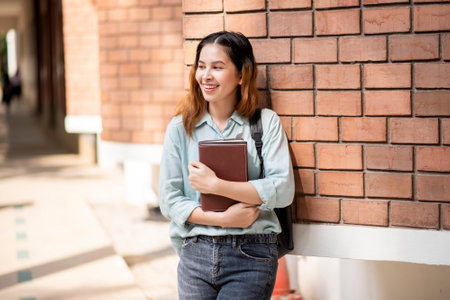 Happy young Asian University student.の写真素材