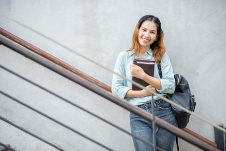 Happy young Asian University student.の写真素材