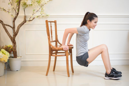 fitness woman exercise in homeの写真素材