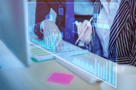 Close up business people are analysis business report with digital virtual screen , Business...