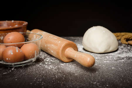Ingredients bakery making on black wooden table