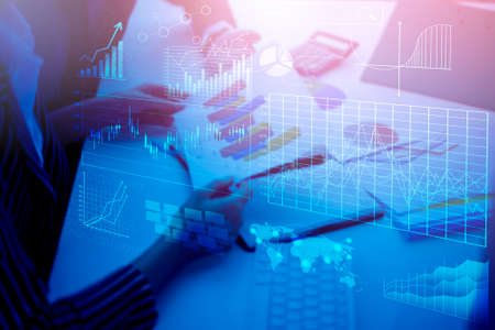 Close up business people are analysis business report with digital virtual screen , Business...