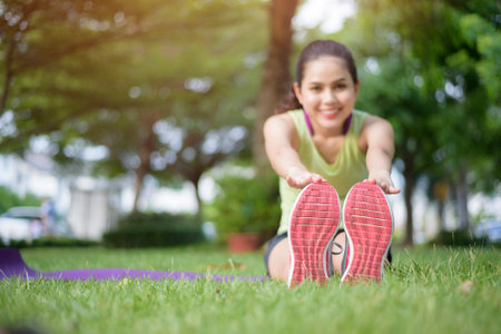 Woman is workout in outdoorの写真素材