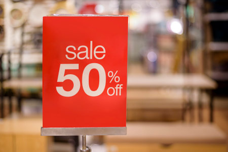 Sale 50 percent sign in shopping mall
