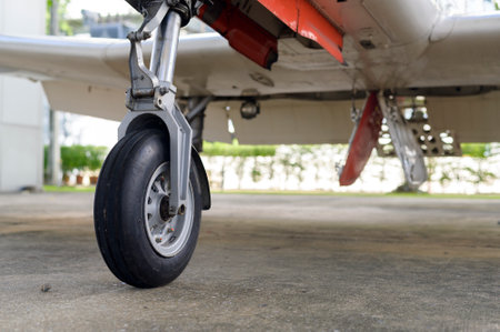 Close up of airplane wheel in an airfieldの写真素材