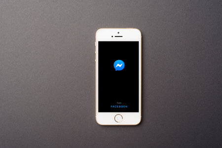 Bangkok, THAILAND, June 12, 2020:Smart Phone with Facebook messenger logo on Apple iPhone SE