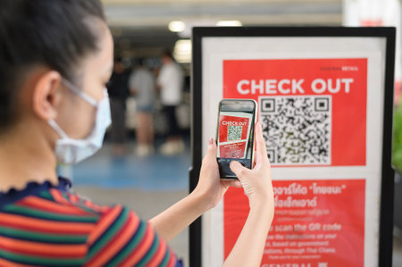 Bangkok, Thailand  - July 17, 2020 : people hand is holding smartphone with Thaichana campaign of...