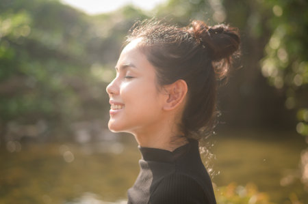 A young woman is enjoying with nature , holiday and travel concept .の写真素材
