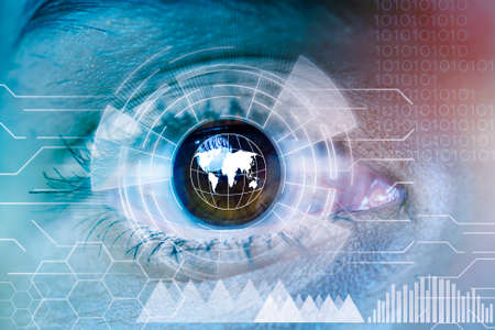 Close up human eye with futuristic technology graphics . Concept of scientific technologyの写真素材