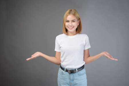 A portrait of short blonde hair woman in studio