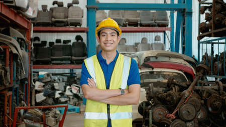 portrait of Caucasian Engineering people  working in heavy industrial plant Engine parts factory .の写真素材