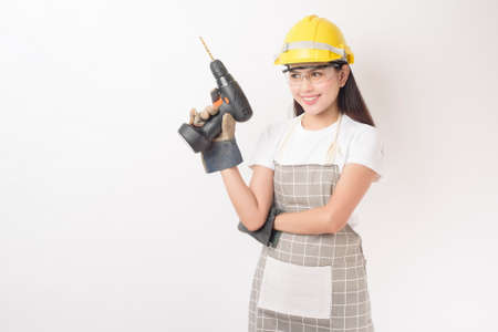 woman technician portrait on white backgroundの写真素材