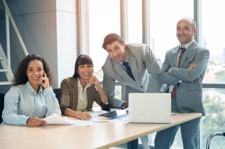 Portrait of confident business people in modern officeの写真素材
