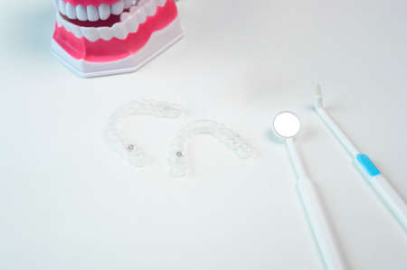 Invisalign braces and tools for dental care, dental healthcare and Orthodontic concept.の写真素材