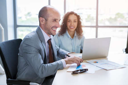 A young business people discussing and brainstorming at modern officeの写真素材