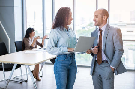 A young business people discussing and brainstorming at modern office