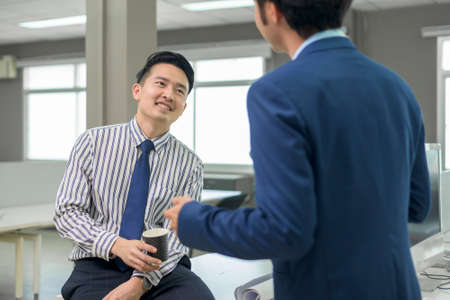 Businessman discussing and planning about strategy in modern officeの写真素材