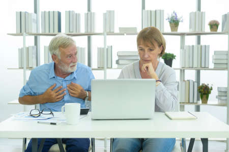 Caucasian senior Business people working and brainstorming in modern office