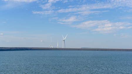 background of wind turbines , clean energy conceptの写真素材