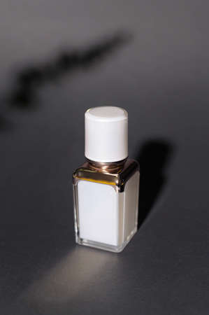 moisturizing cream bottle over black background studio, packing and skincare beauty conceptの写真素材