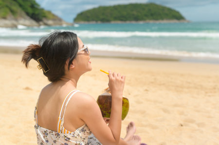 A Young Beautiful woman in Bikini enjoying and relaxing on the beach,  Summer, vacation, holidays, Lifestyles concept.の写真素材