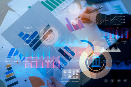 Background of documents with analytics data lying on tableの写真素材
