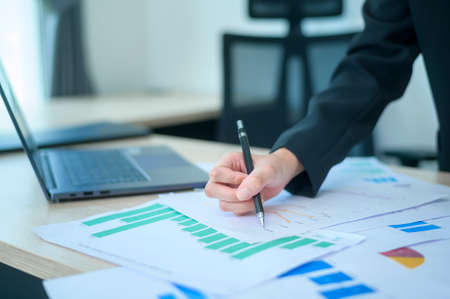 Top view of Documents with analytics data lying on table,selective focusの写真素材