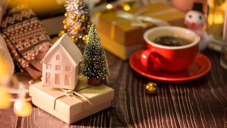 Christmas and Winter decorations on wooden table with decorative lights , Christmas backgroundの写真素材