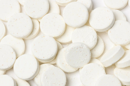 Close-up white medicine pills on white background