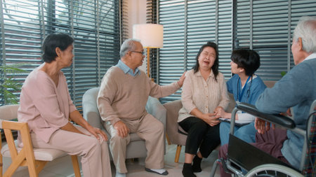 Group of Asian senior people are given advice by professional self care psychologist  at elderly healthcare center, elder group therapy Geriatric consultation conceptの写真素材