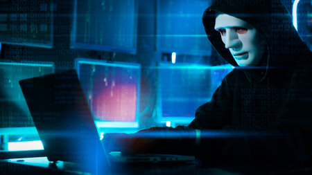 A Hacker is using laptop computer to steal data in the night