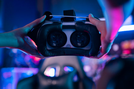 A young Asian woman using virtual reality  , vr box to play online game or watch movieの写真素材