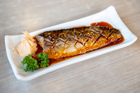 Saba grilled mackerel, Japanese food on a white plate.の写真素材