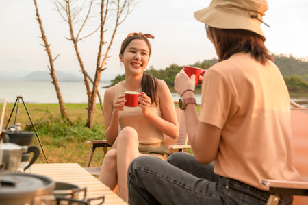 young pretty Asian woman  enjoy campingの写真素材