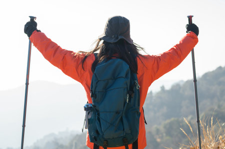 A young traveller trekking on forest trail , Nepalの写真素材