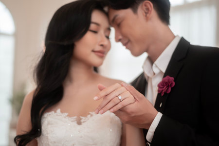 Couple of bride and groom enjoying romantic moments in wedding ceremony, Love, celebration and marriage.の写真素材