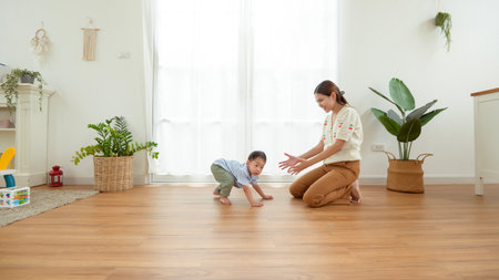 A young boy walks towards his mother in a cozy home. They share a loving moment together.