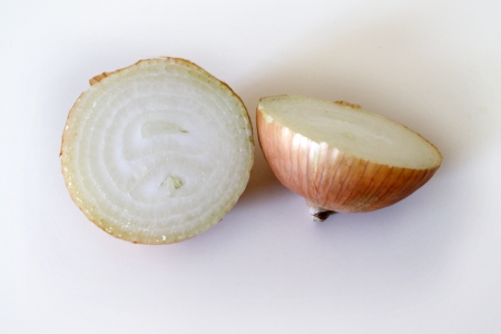 An onion divide in two halves の写真素材