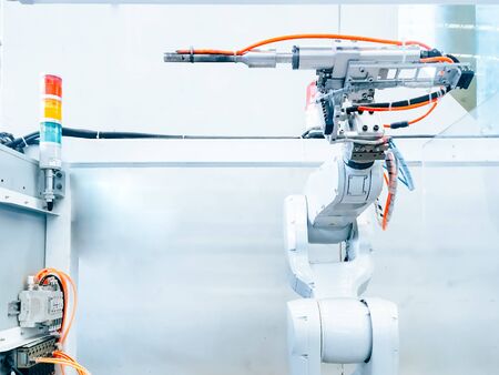 Smart factory industry 4.0 concept from robotic arm machine tool for production line of injection...