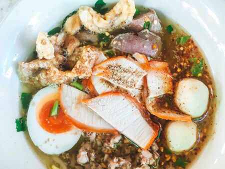 Noodle Tom Yam, noodles with pork and hot spicy soup for lunch or dinnerの写真素材