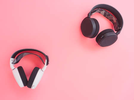 music headphones on pink background.
