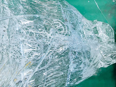 Close-up Melted plastic from Purging material or Clean screw of machine injection.