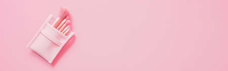 Beauty and makeup concept from blush brush set on pink background. web banner size.の写真素材