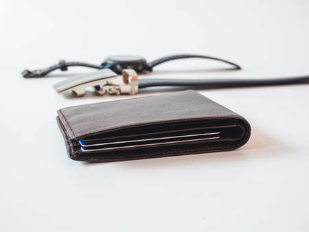 Brown leather wallet on white background.の写真素材