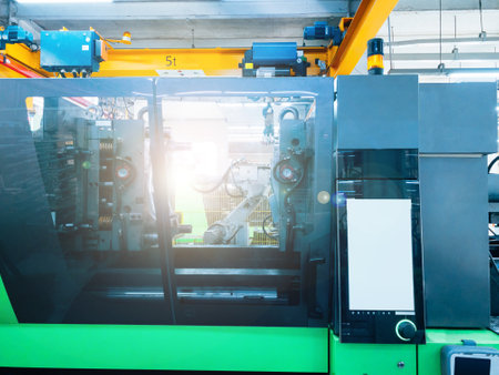 Injection moulding machine in factory.