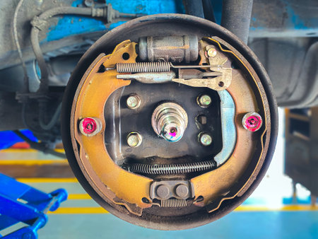 Repairing brake drums, brake pads, handbrake components, and cylindrical brake drums in the rear brake drum set.の写真素材