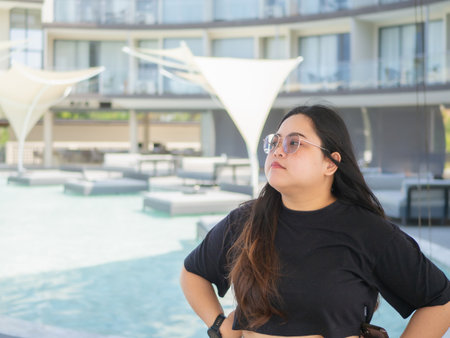 Body positive curvy Asian woman smiling and enjoying casual day.の写真素材