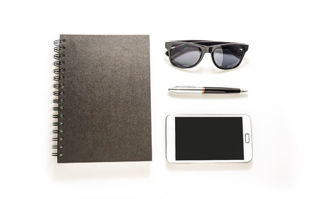 Travel accessories set on white background,book,pen,sunglass,smartphoneの写真素材