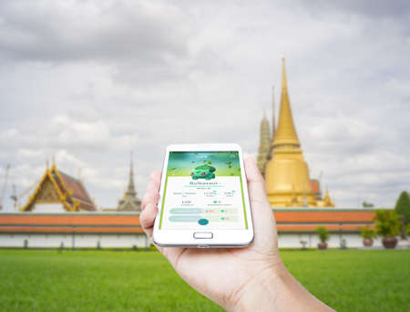 Bangkok, Thailand - July 16, 2016 : Pokemon Go gameplay screenshot on the phone. Pokemon Go is a location-based augmented reality mobile game.のeditorial素材
