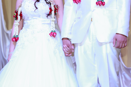 Beautiful wedding couple is enjoying weddingの写真素材